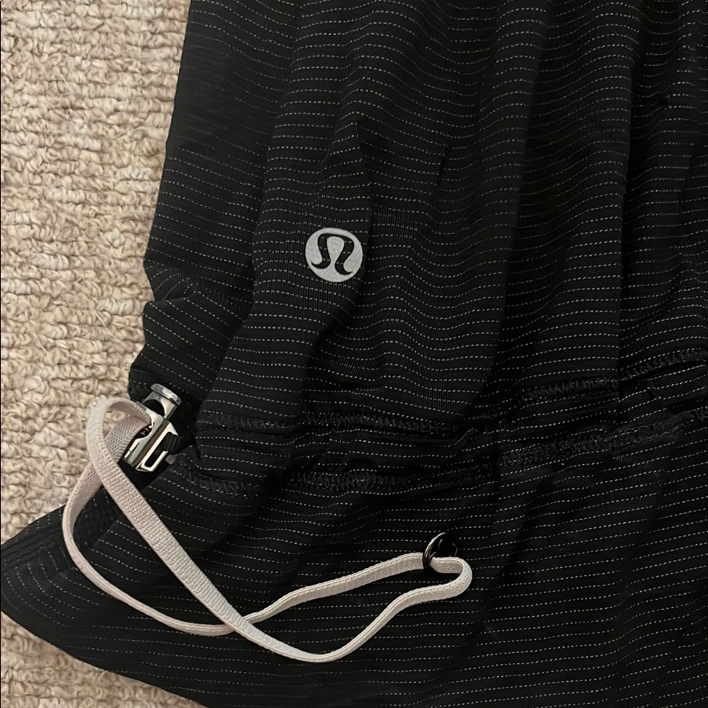 Lululemon top with drawstring and built in sports bra. - Picture 2 of 4